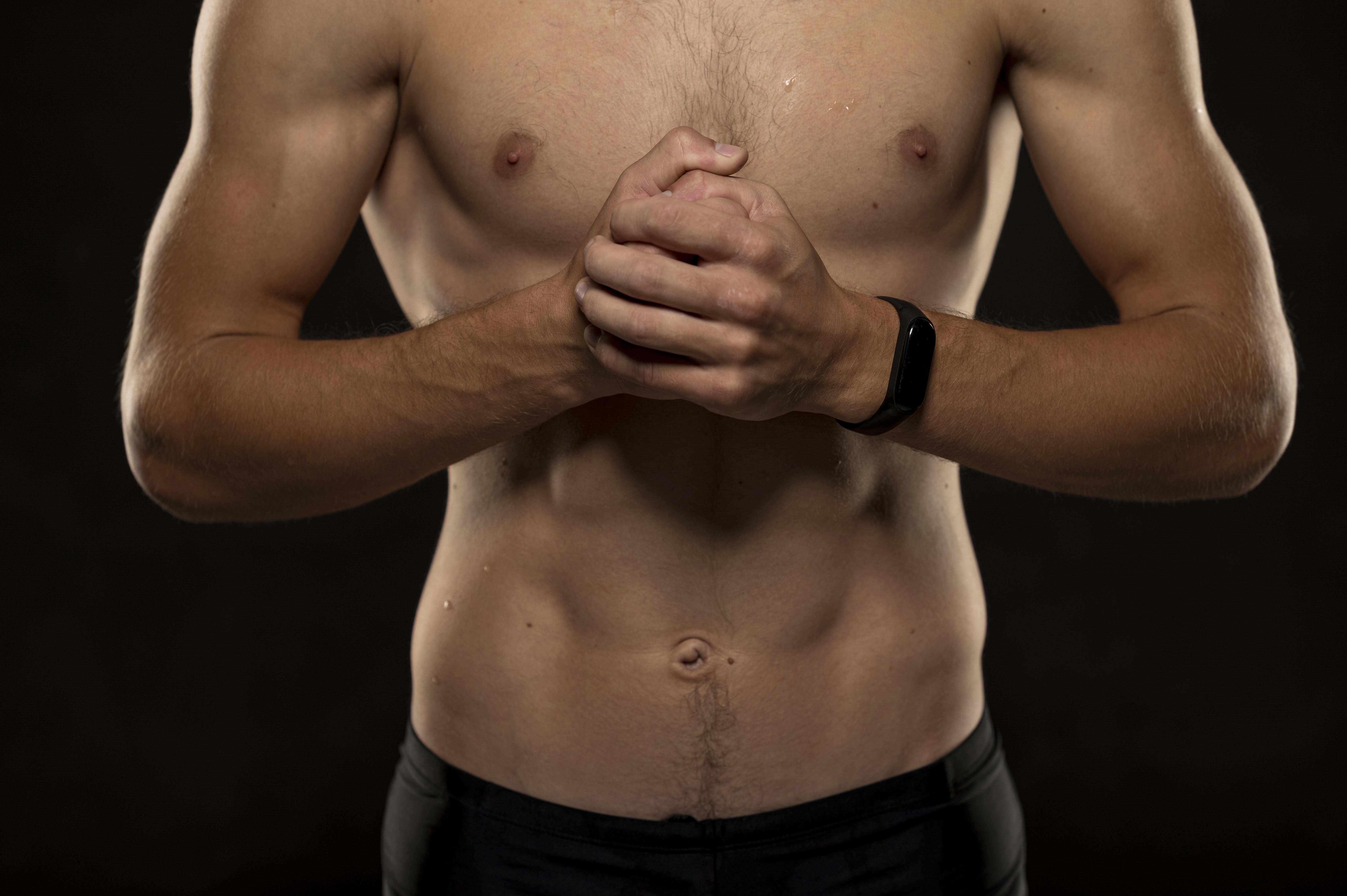 Close up swimmer clenching fists